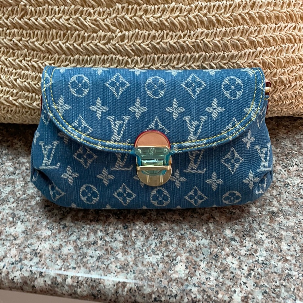 LV denim clutch